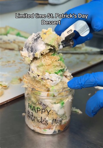 Layers of green swirled vanilla cake brushed with Baileys Irish Cream, filled with Bailey’s Pastry Cream and layered with chocolate shavings and fresh whipped cream. Scooped together into an easily served jar for a tasty pastry experience! Find it at Freed’s Bakery in Las Vegas! #cake #lasvegas #vegasbakery