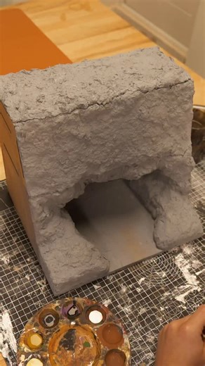 Mon Studios by Ethan Goodbody on Instagram: "On The Rocks 🪨 I always love finding different ways to integrate lighting into models but I’ve pushed the boat out on this one, quite literally 😂 Stay tuned! Couldn’t have done this build without my XTool S1 laser-cutter so click the link in my bio to check it out and a massive thanks to @xtool.official as always! Disclaimer: this model is fan art isn’t affiliated or sponsored by Disney #fanart #tangled #modelmaker #rapunzelhair #cove"