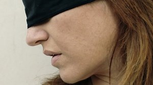 beautiful blindfolded woman: fear, abduction, loneliness, anguish, 4k
