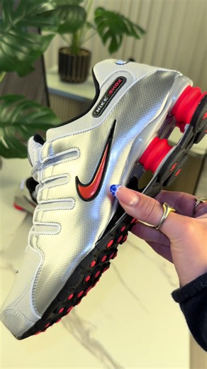 Nike silver sneakers clean look — bright fire style