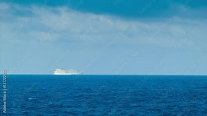 A Cruise Ship alone on the Ocean Horizon Sailing on the Atlantic towards the Caribbean