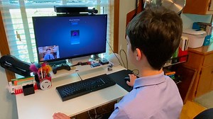 Middle schooler develops software to play music based on facial expression