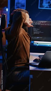 Fatigued developer working overnight at home, rubbing eyes while taking break from coding, feeling sleepy. Tired IT admin exhausted from too much screen time, pausing tasks to rest, camera B