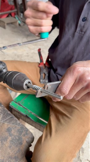 Simple Iron Wire Pressure Spring Making on Drill Machine | Handcrafted Spring #diy #shorts