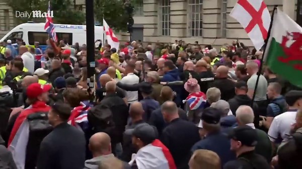 Tommy Robinson spotted at 'Unite the Kingdom' rally in London