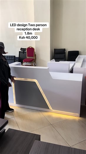 A sleek two-person reception desk with LED accents — perfect for offices that need space, style, and functionality! Now going for KSh 40,000. #woodsharkventures #receptiondesk #officefurnitureke #modernfurnitureke #kenyafurniture
