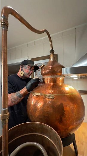 Preparing a copper alembic still with a rye flour mixture
