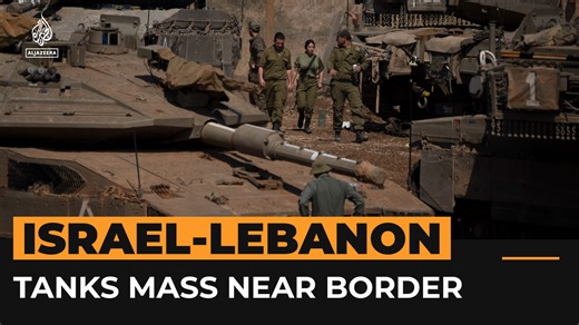 Israeli tanks mass near Lebanon border amid fears of ground invasion