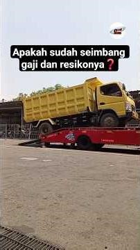 How much does a towing truck driver earn?