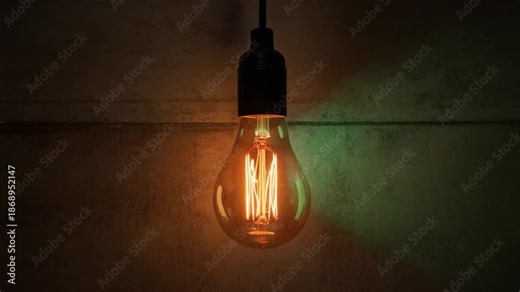 A single glowing incandescent light bulb hanging in a dark, atmospheric room, illuminating its intricate filament.
