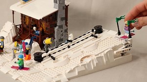 I built a LEGO ski hill and chalet with a working lift and some other fun play features. Created by JK Brickworks https://bit.ly/3wGS9w6 | Beyond the Brick