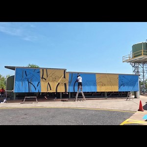 Check out the new artwork on the water filtration shed at the Darwin Aquaculture Centre. Created by Darwin-based Garawa Aboriginal Designs, the mural depicts some of the species the Darwin Aquaculture Centre has researched and developed over the 25 years it has been based on Channel Island, as well as the totemic species of the artists. To provide enough water for the variety of research, development and commercial operations at the Darwin Aquaculture Centre, clean seawater is drawn straight fro