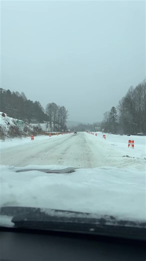 Surviving the Snowstorm: Plow Trucks Clear the Roads