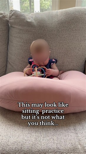 Here, she’s ~4 months and has fair head control, so brief upright positioning is okay, but this is not sitting practice. Here, the Boppy couch setup gives her extra support so she can explore upright posture safely, engage with toys, and practice visual tracking a few minutes at a time. Short increments like this help babies feel upright without getting tired, arching, or stiffening, and they add variety to floor-based play. Remember: floor time, tummy time, and rolling transitions are still the
