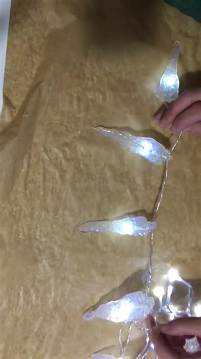 Handmade / homemade icicle Christmas lights. So simple using hot glue gun and battery lights. I hope you enjoy making them as much as we did. #christmaslights #craftideas #christmascraft #handmadechristmas #christmasdecor