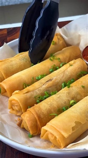 Ajay raghav on Instagram: "Crispy cheese & corn spring rolls 🌯 1️⃣ Mix the filling (no cooking needed 🙌) In a bowl, add — • ½ cup boiled sweet corn 🌽 • ½ cup grated mozzarella cheese 🧀 • 2 tbsp processed cheese 🧈 • 1 tbsp cornflour 🌽 (helps hold everything together) • ½ tsp oregano 🌿 • ½ tsp chili flakes 🌶️ • ¼ tsp black pepper • A tiny pinch of salt 🧂 Mix it all really well — the mixture should be creamy but firm enough to roll 💛 2️⃣ Assemble the rolls: Place 2 tbsp of filling on a sp