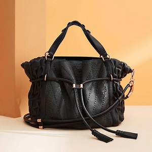 With its super-soft, pillowy leather and unique ‘pinched’ silhouette, our Body of Space Tote is one for your lust-list. You just have to act fast. She's limited...only 50 on Earth created. Shop Limited Edition > https://goo.gl/oG9yn5 | Mimco