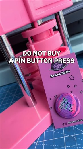 Pretty Rotten Girls on Instagram: "⚠️ warning: making pinback buttons WILL rot your brain. Watch me make custom badges for my shop. I have a variety of holo, glitter & glossy chaos available 🔗 link in bio #pinbackbuttons #howto #pinbutton #asmr #diy #smallshop #crafting #goth #emo #rocker #buttons #buttonpins"
