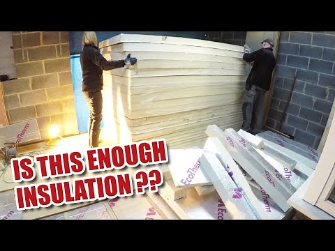 Insulation and fitting chipboard flooring for our extension