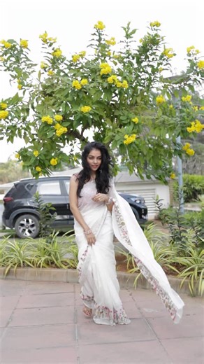 Kajol & Anika(Mom & Me) | Fashion & Lifestyle Influencer 💗 on Instagram: "Pure white, elevated with a splash of colour 🌈 This white saree with vibrant thread-work borders is where grace meets art. Minimal base, maximum elegance — perfect for days you want your style to speak softly yet shine loudly 🤍✨ Keywords White saree, colourful thread work saree, embroidered border saree, elegant saree, festive wear saree, party wear saree, ethnic fashion, Indian saree, designer saree, minimal saree look