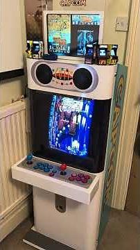 Capcom Mini Cute with active LCD marquee and mini arcade models.