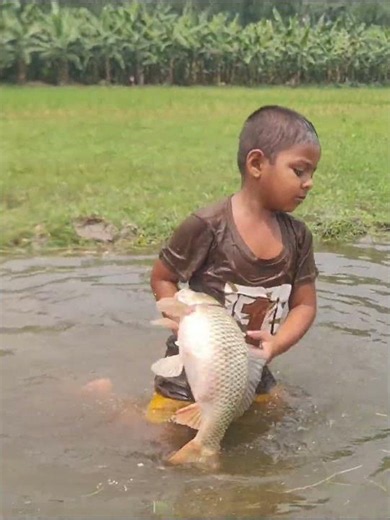 Adorable Kid Catching Fish