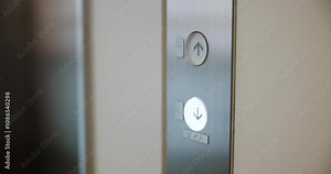Hand, pressing and button for elevator in office building for floor, selection and lift request. Businessman, click and arrow for down, activation and closeup as accountant for company or corporate