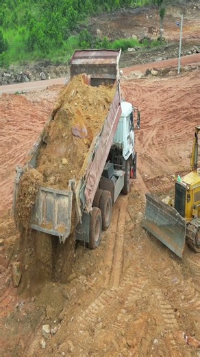 EP543 Dozer Pushing Stone Clearing Land with Trucks 15Ton Dumping on the Mountain