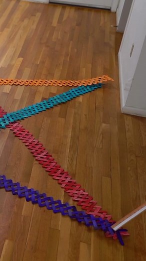exploding star effect made with popsicle sticks! ⭐💥 #dominoes #chainreaction #kineticart #satisfying #dominoesfalling
