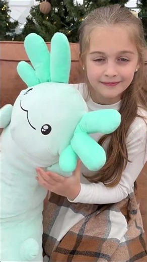 This cute plush axolotl pillow makes the perfect gift for anyone who loves soft, snuggly surprises.