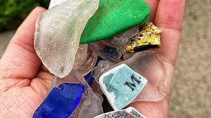 Beach glass starts as trash before becoming treasure. Where and how to find it in Erie