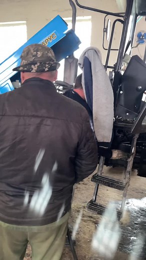 Tractor Engine Repair in a Workshop Setting
