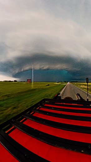 The BEAR'S CAGE! 🛻🌪️😬 Do you see that TORNADO?? We were tracking and reporting on a powerful supercell in Oklahoma, navigating one of the most dangerous areas in storm chasing—known as the “bear’s cage.” In storm-chasing terminology, the bear’s cage refers to the region beneath a rotating wall cloud (the “bear”), surrounded by heavy precipitation like rain or hail (the “cage”). This area is often associated with storm-scale rotation, such as a radar hook echo or mesocyclone, and carries a hig