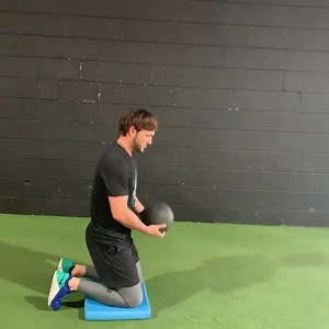 Kneeling Med Ball Side Toss - Here is a ballistic movement we use during our initial phase of the offseason for baseball athletes. - By kneeling we can eliminate the lower limbs and focus on a larger range of rotation. - The focus is to stabilize the hips and relax the trunk to generate this larger range just like a golf swing. - Typically through the eccentric portion of side toss athletes try to generate max force in turn locking up the full range of motion in the spine. - While we ultimately 