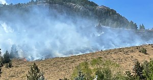 Crews mopping up wildfire on Mount Helena