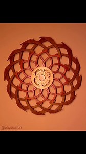 Deja Vu II: another favorite in my collection- an astonishing spring powered kinetic art form. Crafted from wood this device has two disks, each with a pattern of curved spokes that can rotate at different rates and direction to produce interesting illusions of motion via moiré interference effects. A ribbon spring drives an ingenious mechanism that uses ratchets (and the rotational momentum of the disks) to create the various visual modes- a half rotation of the disks will result in 20 minutes 