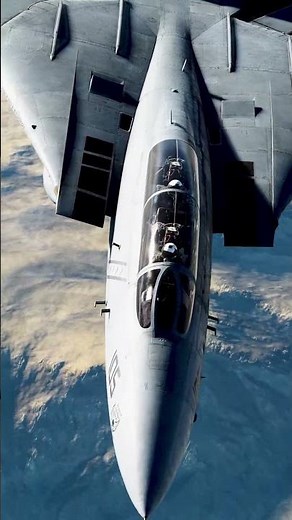 INVERTED SOUND BARRIER BREAK: F-14B pilots enjoying the agility of their Tomcat at 25,000 feet.