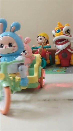 labubu rides a rotating bicycle