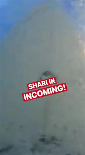 SHARK CHARGES SURFER!