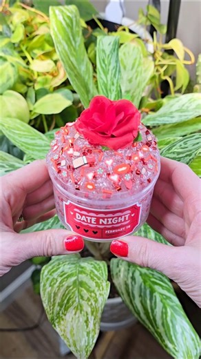 🍍 CinnaCrew Slimes 🍍 on Instagram: "What's your favorite kind of date night? Restocking this Friday at 3pm PST! Date Night is a super crunchy bingsu slime. It's a packed bingsu slime that's gets super fluffy and really crunchy! It's a crystal clear base with iridescent bingsu beads and metallic bingsu beads sprinkled throughout. Scented with Champagne Toast that's a dupe for the BBW. It's so yummy and is perfect for the date night theme. Comes with a fake rose and fun date inspired sprinkles l