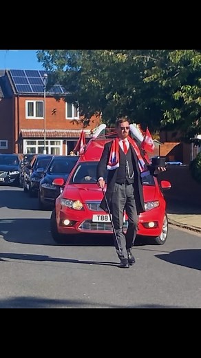 Yesterday, we had the honor of conducting the funeral for Daniel Johnson, affectionately known as Danny Johno. As we made our way, the Liverpool hearse led the procession, and it was heartwarming to see what felt like half of the Kop turn out to bid farewell. Danny was not just a massive Liverpool fan; he was a beloved figure to everyone who knew him. The beautifully crafted Liverpool coffin, adorned with images of Anfield and the Liver Buildings, stood as a fitting tribute to his passion for hi