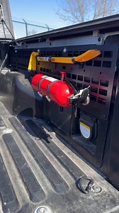 6.9K views · 38 reactions | Des shows us how she uses our Tacoma Bed Molle Panels to secure down gear! Anything from an axe to fire extinguishers can be mounted directly to our molle panels. You can find yours at Caliraisedled.com! #toyota #offroad #overland #prepper #mutheprepper #preparedness | Cali Raised LED | Facebook