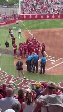 Fans at OU softball game help young boy sing National Anthem after he starts to cry #shorts