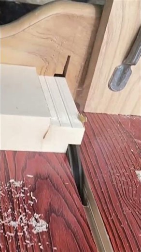 Cutting wood pieces precisely with a table saw to create joint connections for furniture assembly