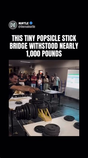 Nurtle on Instagram: "A bridge built entirely from popsicle sticks managed to support 948 lbs (430 kg) during a load test. The structure was designed as a truss, spreading weight through triangles instead of relying on the sticks’ raw strength. Each stick is weak on its own, but when glued and aligned correctly, the load gets distributed across the entire frame. That reduces bending, limits weak points, and allows the bridge to carry far more weight than expected. Tests like this are common in e
