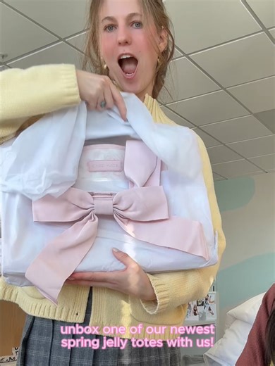 unboxing our new afternoon rosé bow pr samples 🎀 we could not be more obsessed! join the waitlist via link in bio! #jellybag #jellytote #casemate #bowbag #unboxing #comingsoon #unboxwithme