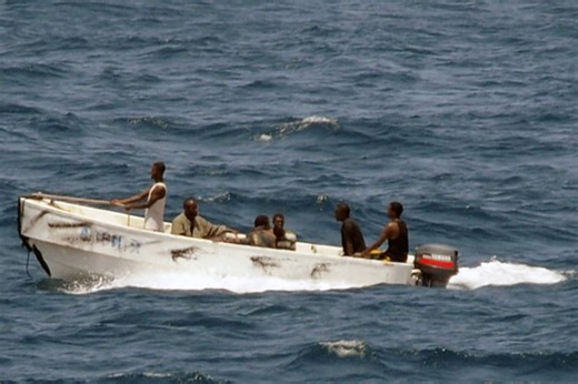 Pirates firing rocket-propelled grenades board tanker
