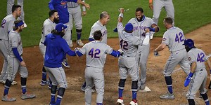 Rosario, Mets walk off on Yanks' home turf