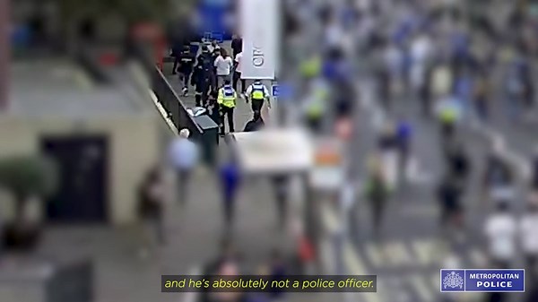 Boy in comic con costume is tackled to the ground by police