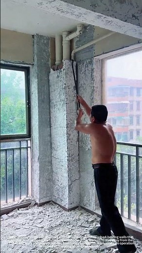 Demolish walls using a crowbar with a hook
